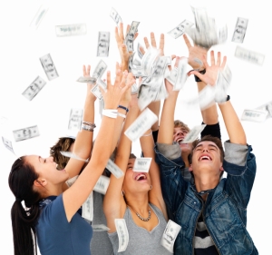 Young men and women playing with money agai9nst white background